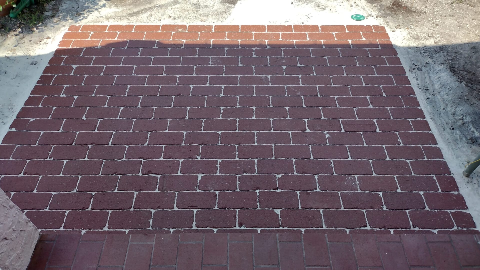 Burgundy square paver pad